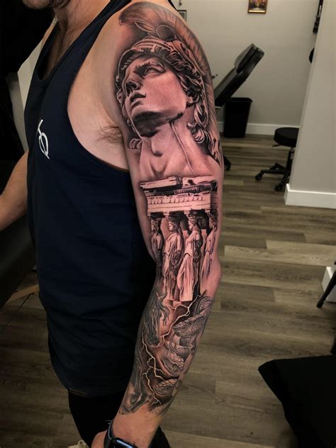 greek mythology arm sleeve tattoo.